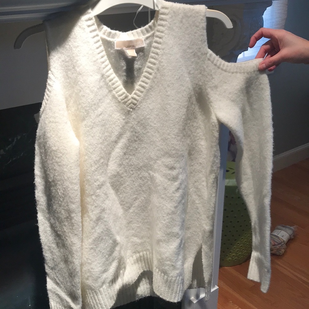 white sweater. shoulder cut out. never worn